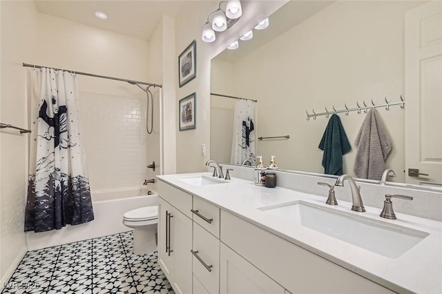 full bathroom with vanity, toilet, and shower / bath combo