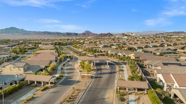 birds eye view of property featuring a mountain view