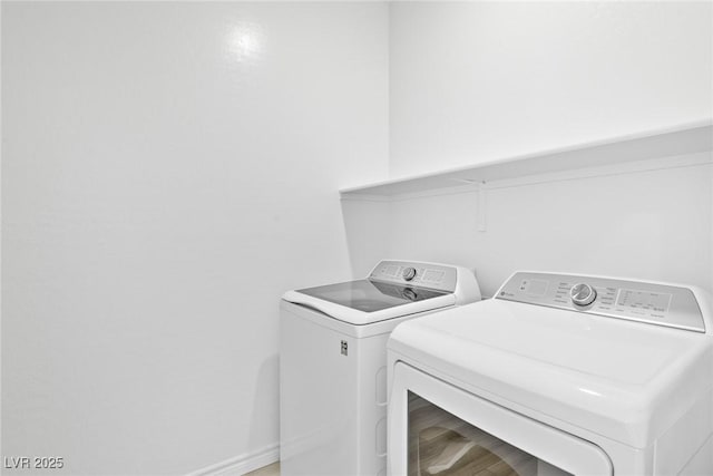 washroom featuring separate washer and dryer