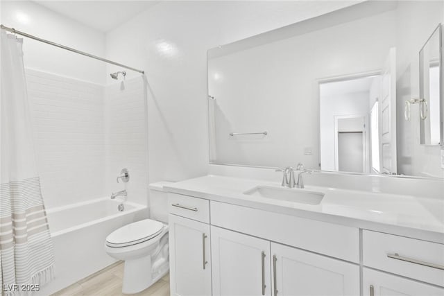 full bathroom featuring vanity, wood-type flooring, toilet, and shower / bath combo with shower curtain