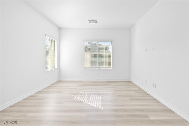 empty room featuring light hardwood / wood-style flooring