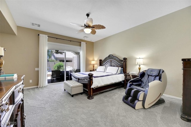 bedroom featuring light carpet, access to outside, and ceiling fan