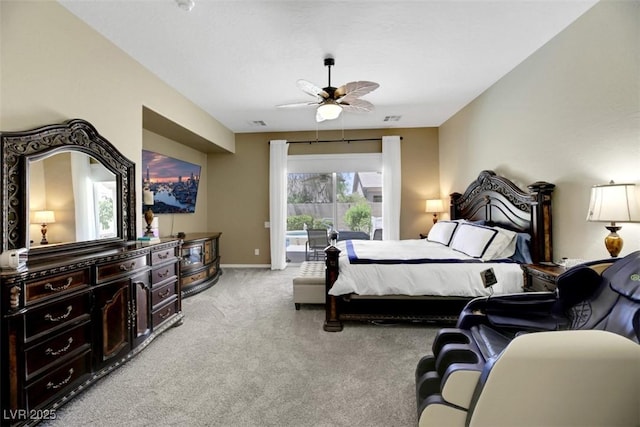 carpeted bedroom featuring ceiling fan and access to outside