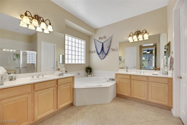 bathroom featuring shower with separate bathtub, ceiling fan, vanity, and tile patterned floors