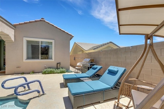 view of patio / terrace featuring grilling area