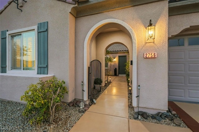 entrance to property with a garage