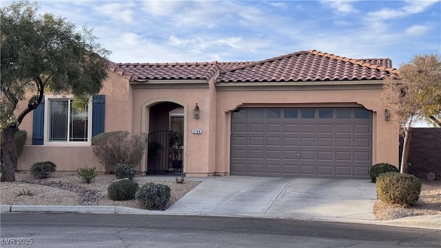 mediterranean / spanish-style home featuring a garage