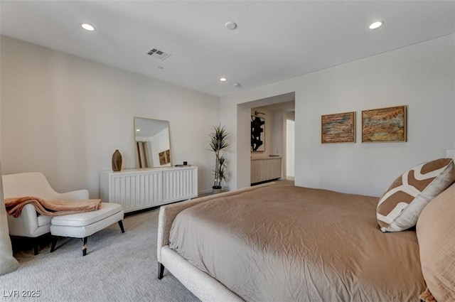 bedroom with recessed lighting, visible vents, and light colored carpet