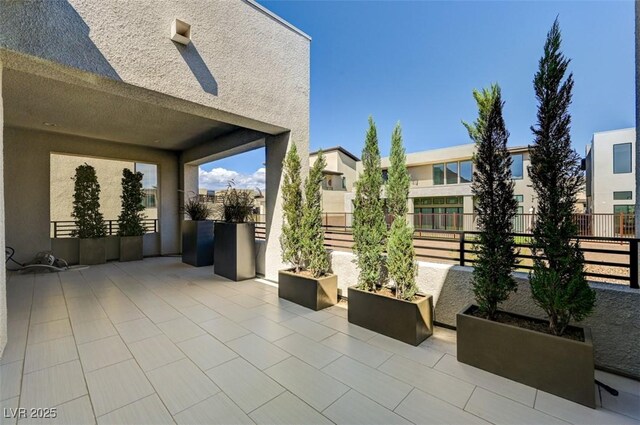 view of patio with fence