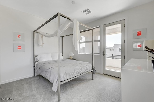 bedroom featuring access to exterior, baseboards, visible vents, and light colored carpet