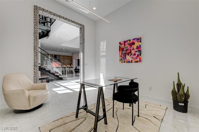 dining room with baseboards, stairway, marble finish floor, a high ceiling, and recessed lighting