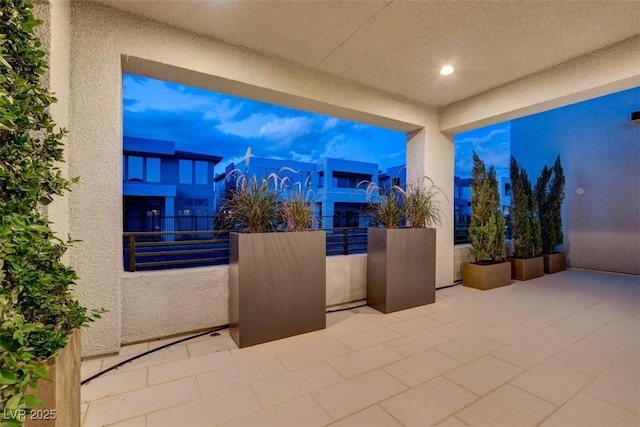 view of patio / terrace with a balcony