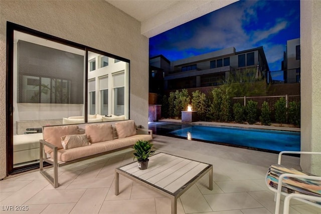 view of swimming pool featuring a fenced in pool, a patio, an outdoor living space, and fence