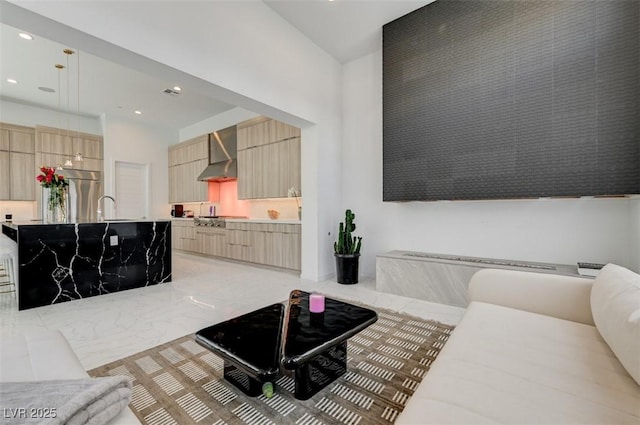 interior space featuring marble finish floor and recessed lighting