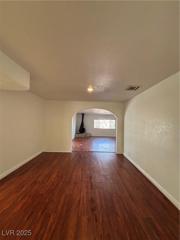 interior space with dark wood-type flooring