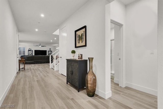 hall with light wood-type flooring