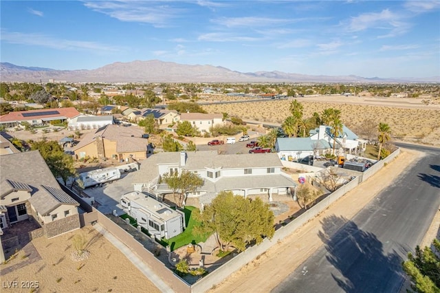 bird's eye view with a mountain view