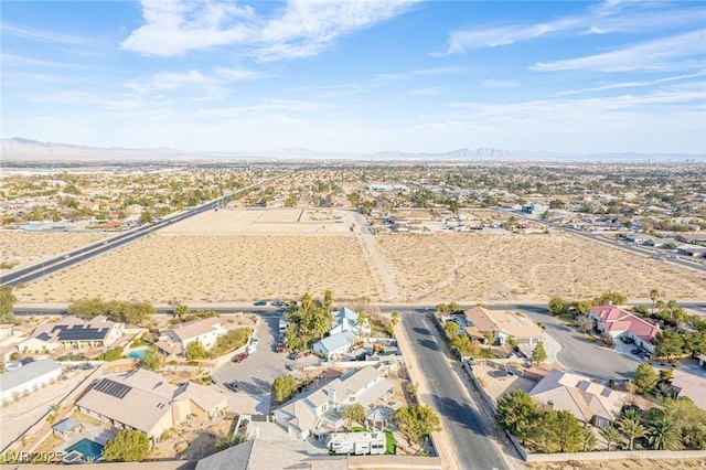 drone / aerial view featuring a mountain view