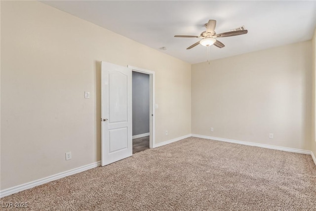 unfurnished room featuring carpet flooring and ceiling fan