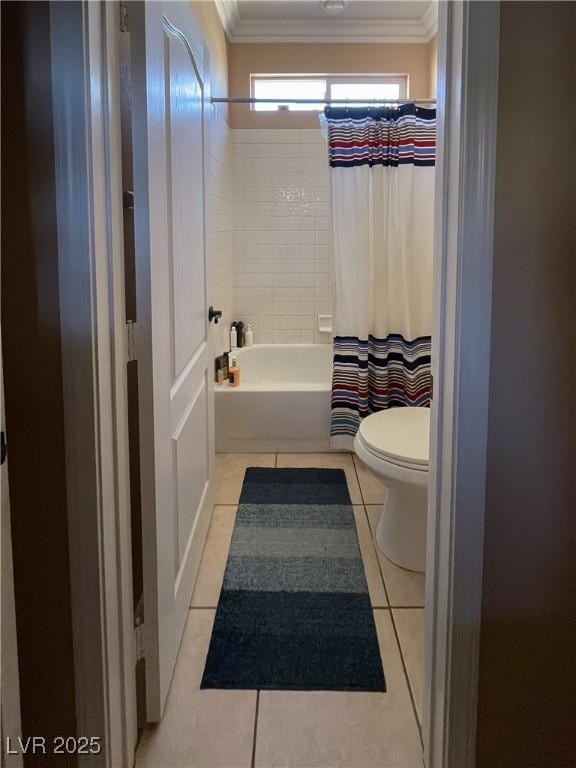 bathroom with crown molding, tile patterned floors, and shower / bath combo