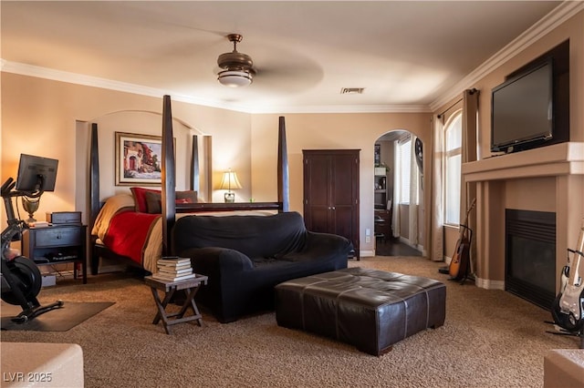 carpeted bedroom featuring ornamental molding