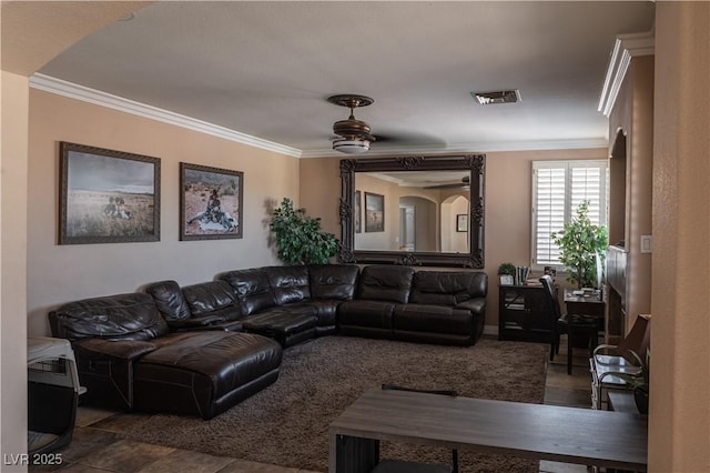 living room with ornamental molding