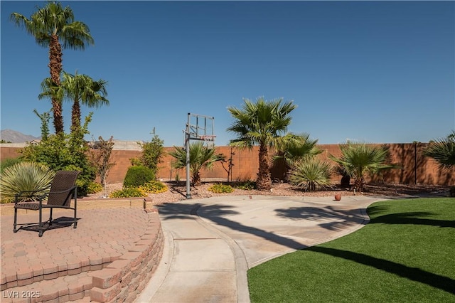 view of patio / terrace featuring basketball court