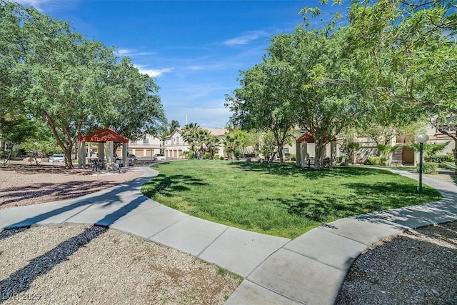 view of home's community with a gazebo and a lawn