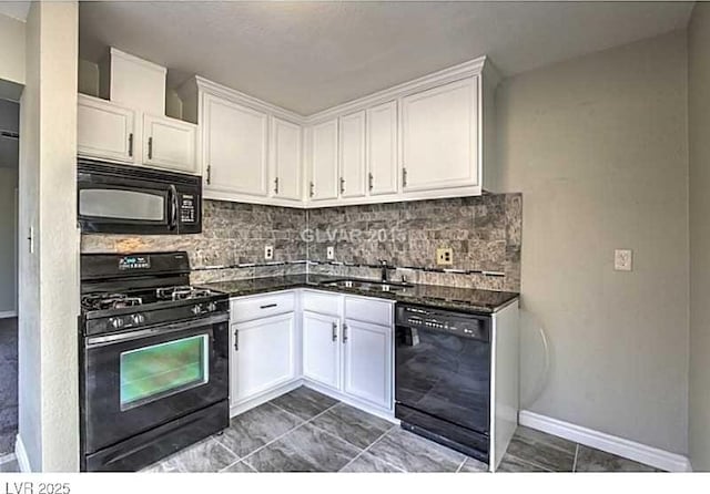 kitchen with sink, white cabinets, and black appliances