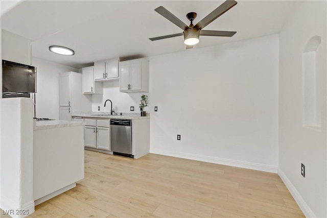 kitchen with sink, light hardwood / wood-style flooring, dishwasher, ceiling fan, and white cabinets