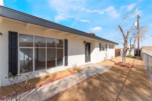 back of house featuring a patio