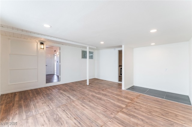 empty room with hardwood / wood-style floors