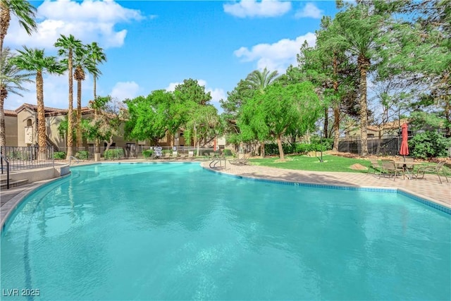 view of pool featuring a patio