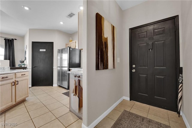 view of tiled foyer entrance