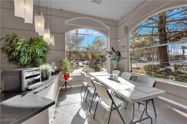 sunroom featuring a wealth of natural light