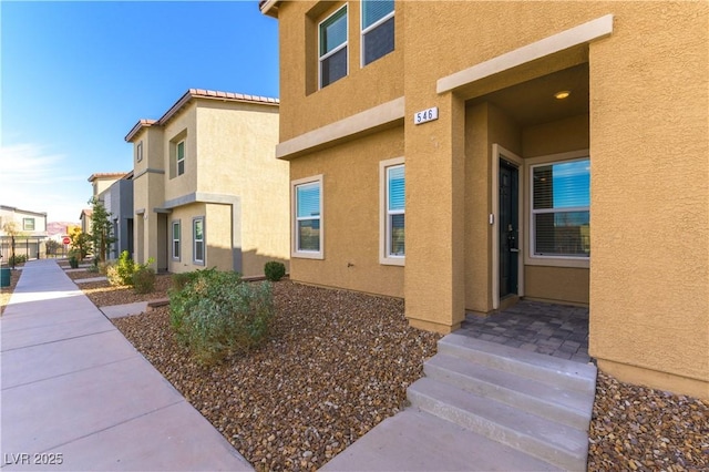 exterior space with stucco siding