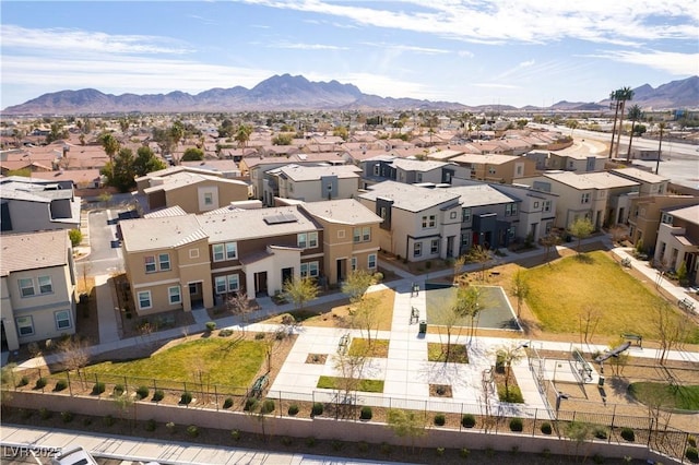 bird's eye view with a residential view and a mountain view