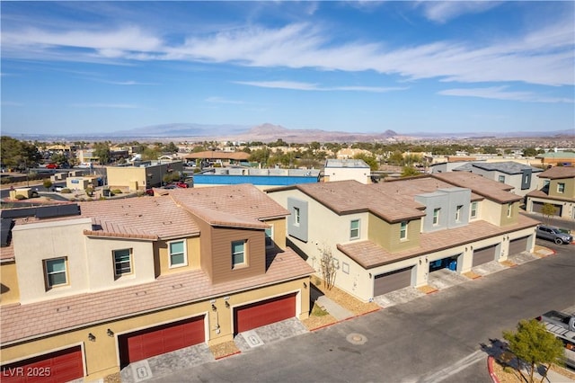 bird's eye view with a mountain view and a residential view