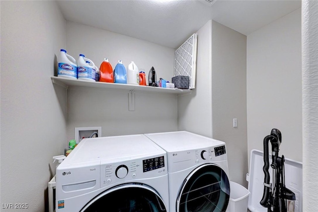 washroom with separate washer and dryer