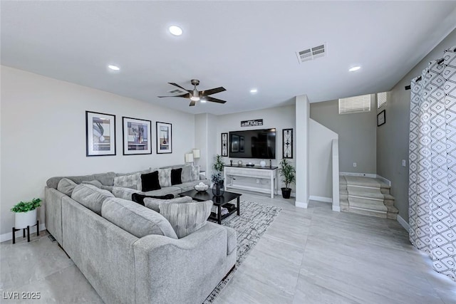 living room featuring ceiling fan