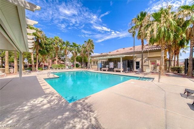 view of swimming pool featuring a patio