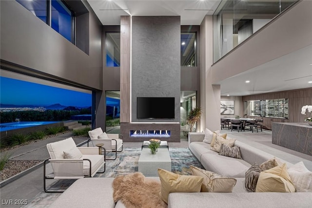 living room with a towering ceiling