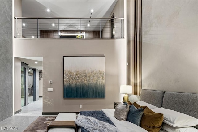 bedroom with a towering ceiling