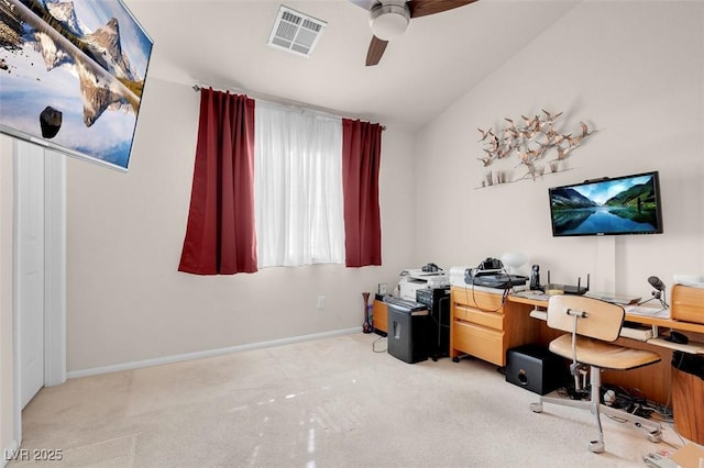 carpeted home office with ceiling fan