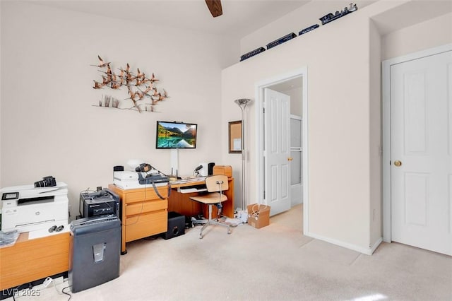 home office with light colored carpet and ceiling fan