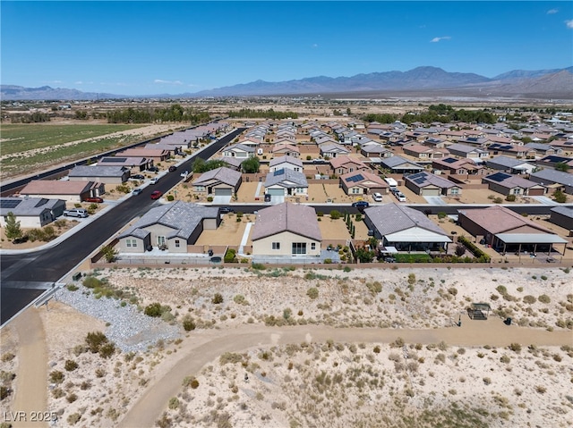 birds eye view of property featuring a residential view and a mountain view