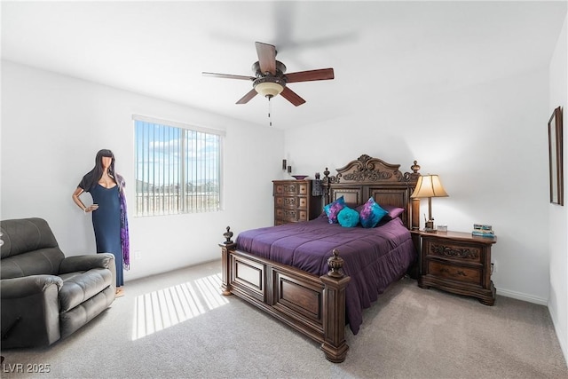 carpeted bedroom featuring a ceiling fan