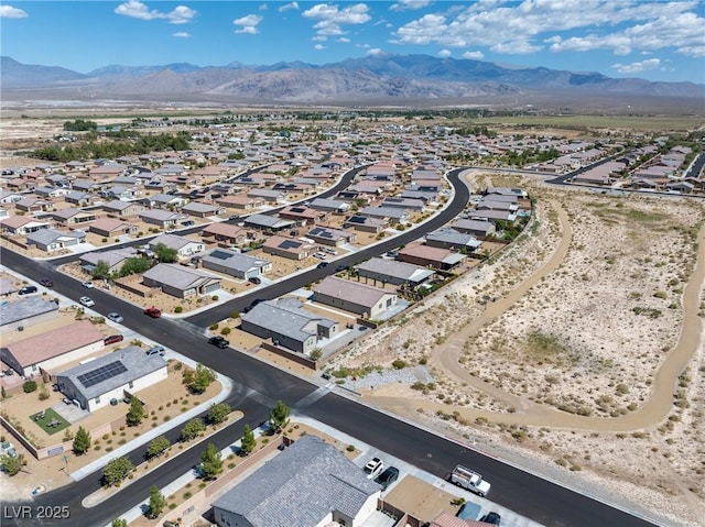 bird's eye view featuring a residential view and a mountain view