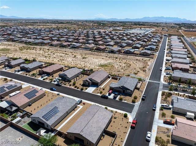 birds eye view of property with a residential view and a mountain view