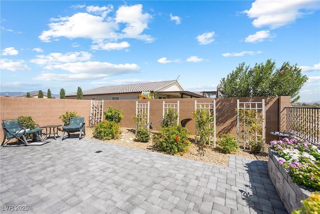 view of patio with a fenced backyard